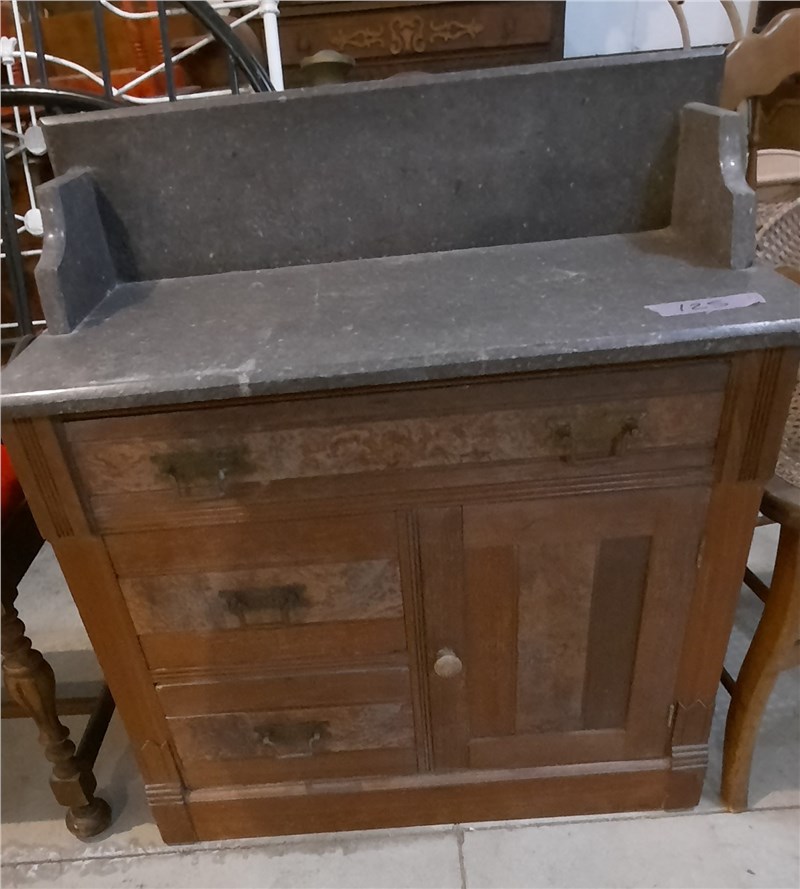 marble top and back splash commode