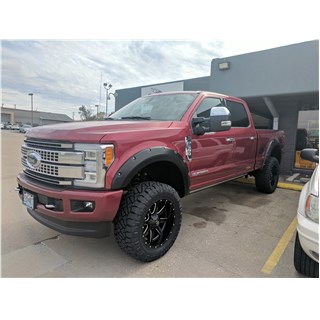 2018 F-250 leveled with 35x12.50R20's and fender flares